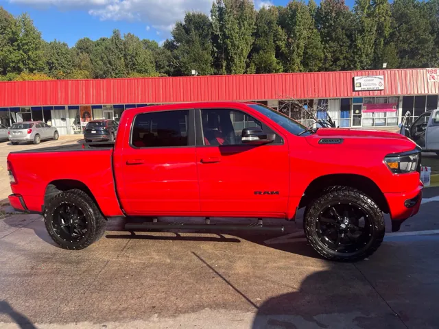 Red pickup outside the Redline detailing shop