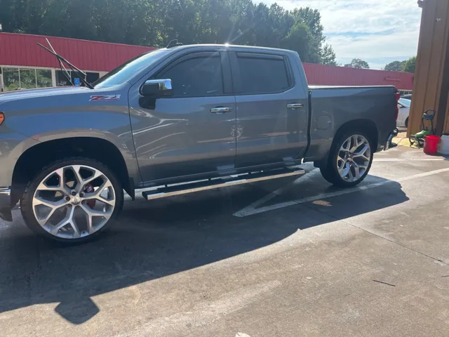 Silver pickup outside the Redline detailing shop